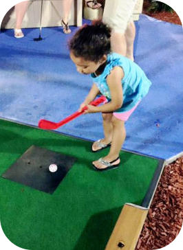 Child golfing